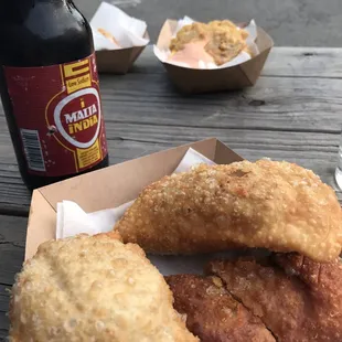 Empanadillas, tostones and Malta