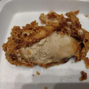 a chicken dish in a styrofoam container