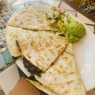 two quesadillas on a plate