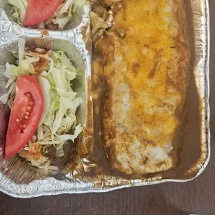 Carne Asada super wet burrito .  Carne asada, beans, rice, pico degallo, sour cream , cheese and guacamole.