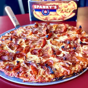 Pepperoni, prosciutto, roasted tomatoes, drizzled with Mike's hot honey!