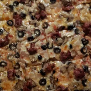 Cheese, sausage, fresh mushrooms, onions &amp; black olives