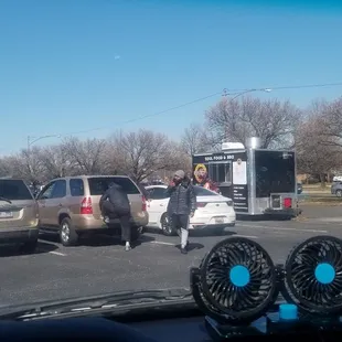 Branch Ave side of Iverson Mall parking lot in front of a "coming soon" Shopper's Way store.