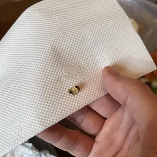 a person holding a piece of paper