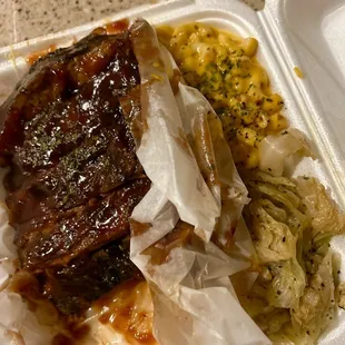 Ribs, macaroni and cheese and cabbage, and the ribs were grill fresh