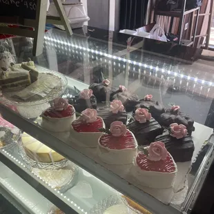 a variety of cakes on display