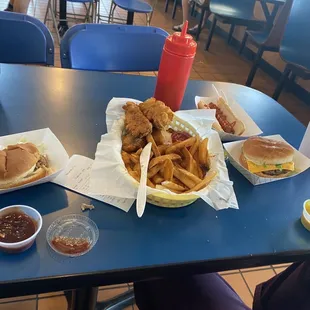 Bbq sandwich, chicken tenders and fries, hot dog, cheese burger
