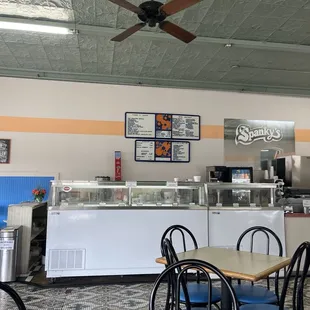 front of ice cream counter...blue cheese ice cream?!