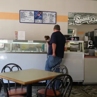 a man standing at the counter