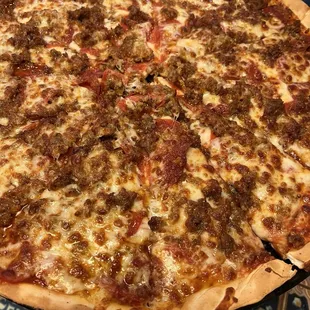 Large thin crust Pepperoni Passion with added Italian sausage.