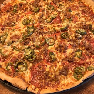 Large thin crust Pepperoni Passion with added sausage and jalapeños