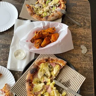 Two small personalized pizzas and hot wings