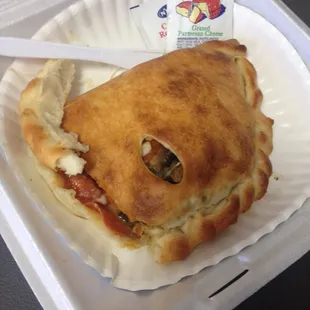 Mouth watering! Calzone. Omgggg the dough was so delicious and soft and flaky omg I can't believe it's a pizza dough! Wow!!