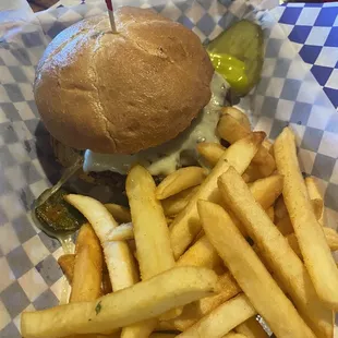 a burger and fries in a basket