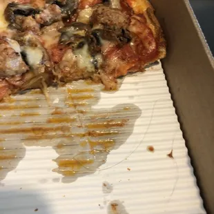 Hair in bottom right corner of box (has small amount of cheese attached