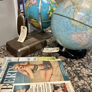 Old magazines and globes
