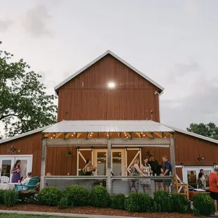 Porch with couch seating just off the bar area.