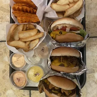 a tray of hot dogs and fries