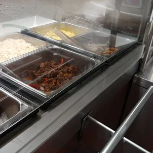 a buffet of food being prepared