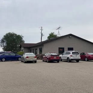 several cars parked in a parking lot
