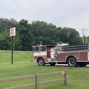 a fire truck parked on the side of the road