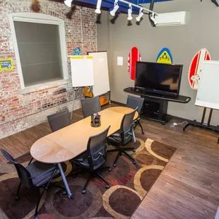 The Board Room is our smallest room with room for 2-6 people. It's great when you need a quick meeting space with a client.