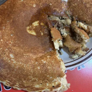 GIANT chocolate chip pancake with crispy bacon.          6. One Big Pancake with Choice of Meat