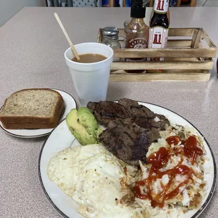 Steak and eggs w hash browns, avocado, gluten free toast and a large coffee!