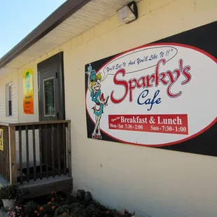 a sign for sparky&apos;s cafe