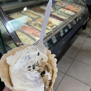 Cake batter ice cream with a cookie dough mix-in, in a waffle cone- yum!