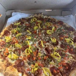 See how the toppings are perfect, just the right amount and the crust pinched.