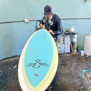 Surfboard glassing