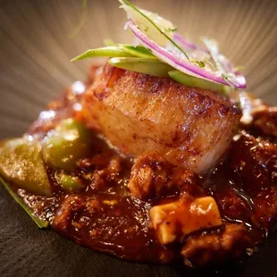 Pan seared scallop, fava bean, radish, lemongrass, finger lime, mapo tofu