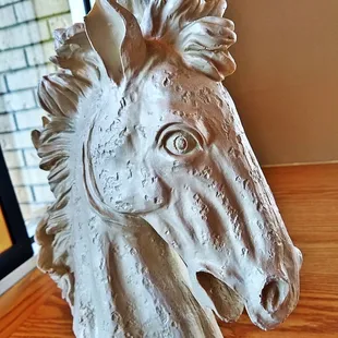 a horse head on a table