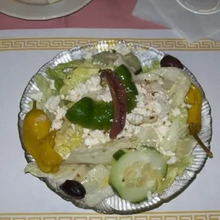 Grecian Salad Served with our very own Garlic Toast