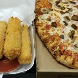 Large 2 topping pizza special with mozzarella sticks. Was only $9.99!! Great deal and great food too!