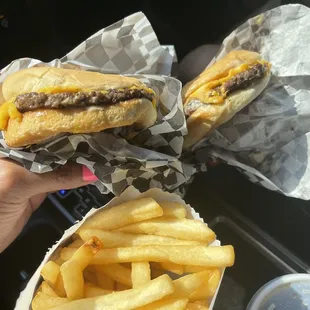 two sandwiches and fries