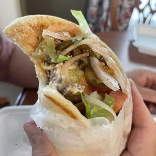 One large bite of Prometheus gyro