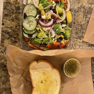 Greek salad and garlic bread