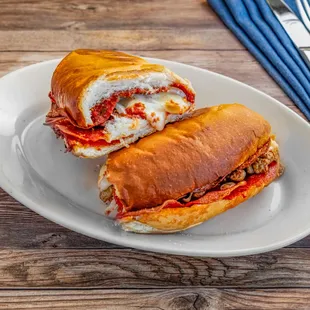 Italian Sub: Italian sausage, salami, pepperoni, onion, Danish cheese, pizza sauce. Served with salad or soup.