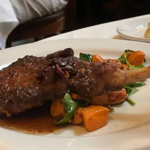 Pork chop with red wine reduction, and sweet potatoes