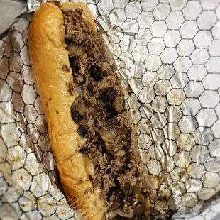 Cheesesteak with grilled onions and mushrooms
