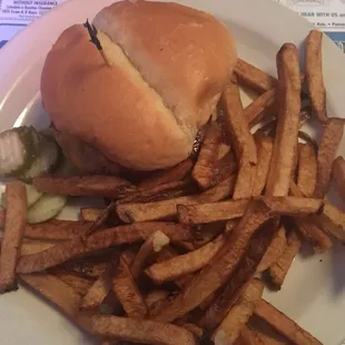 a plate of french fries and a sandwich