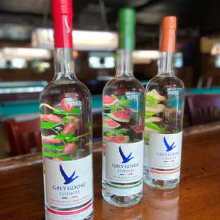 three bottles of grey goose