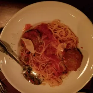 Tasty spaghetti and meatballs with hardly any pomodoro sauce. Skimpy portion not worth $13.99