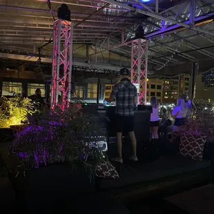 a group of people sitting at a bar