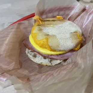 a breakfast sandwich in a basket