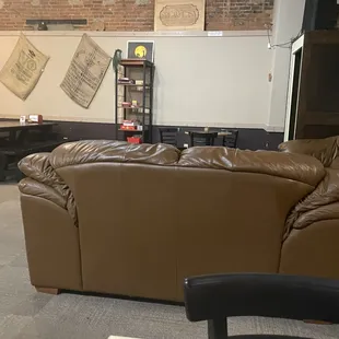 a coffee table and couch in a coffee shop