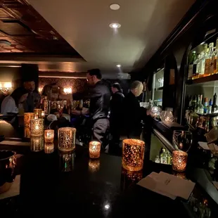 people in a dimly lit bar