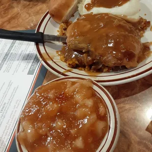 Smothered pork chop and cinnamon apples